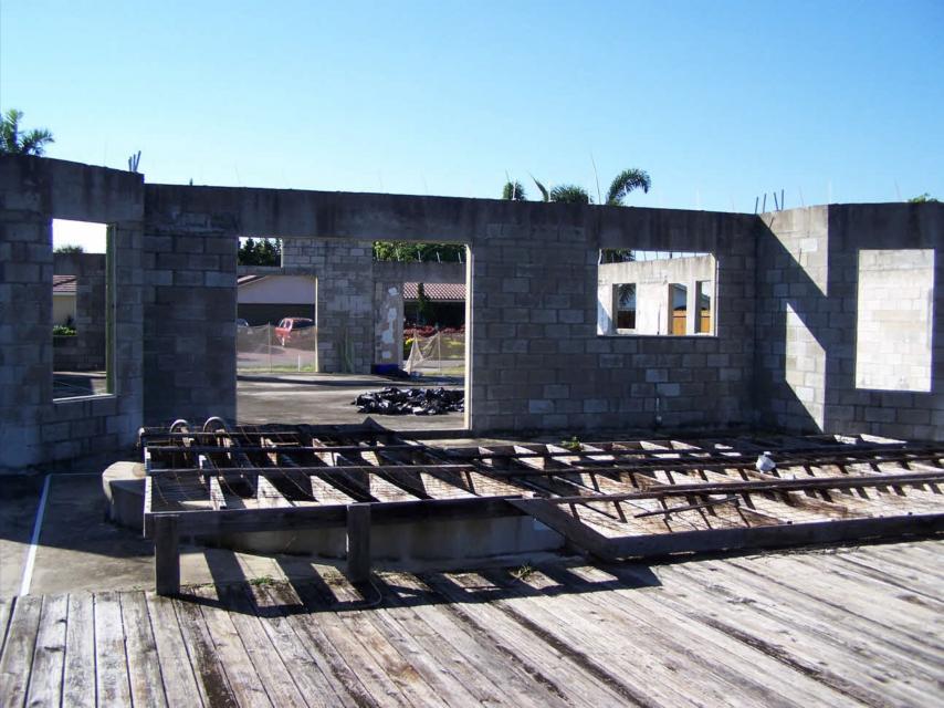 house being rebuilt during a fix and flip