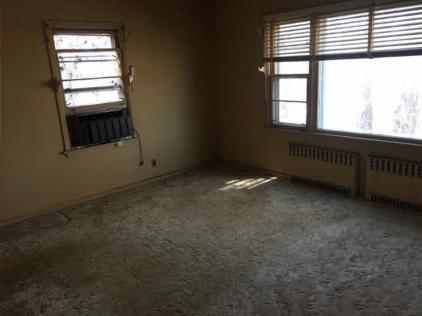 Bedroom before renovations from fix and flip loan by new york hard money lending company