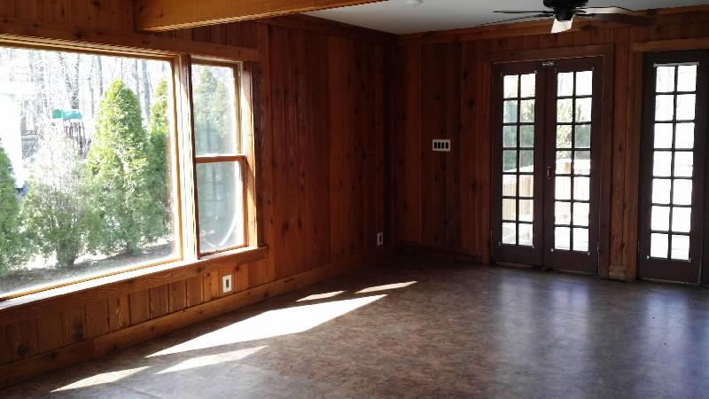 family room before renovations funded by a private lender in norwalk connecticut