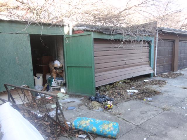 Garage before renovations funded by a hard money lender in new york