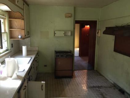 Kitchen before renovations from recently funded fix and flip loan by a hard money lender in new york