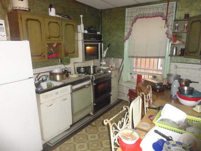 Brooklyn kitchen before renovations funded by a fix and flip loan in new york